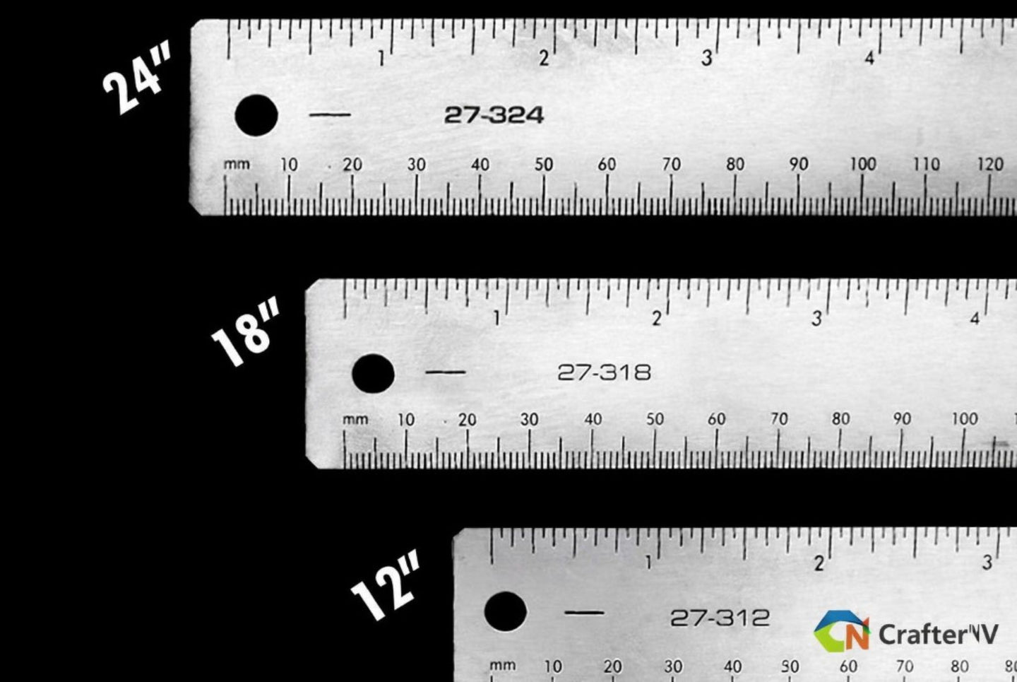 Three metal rulers with measurements in inches and millimeters on a black background.
