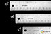 Three metal rulers with measurements in inches and millimeters on a black background.