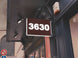 Digital display showing the number '3630' on a building exterior.
