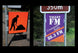 Two road signs; one orange with a black silhouette of a person digging, the other purple and orange Valley FM Community Radio sign.