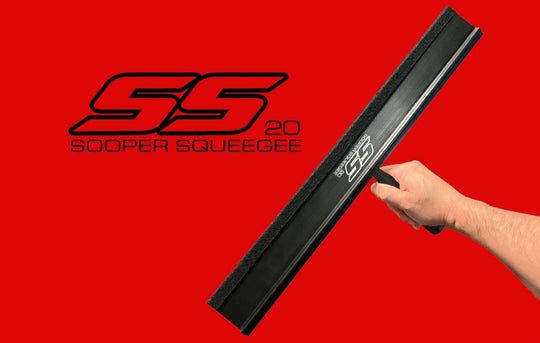 Hand holding a squeegee with 'SS' logo on a red background
