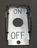 Metal toggle switch with 'ON' and 'OFF' labels on a dark background