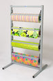 Rolling paper display stand with colorful paper rolls on a white background