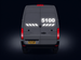 Back view of a gray van with visible Mercedes logo on a dark background